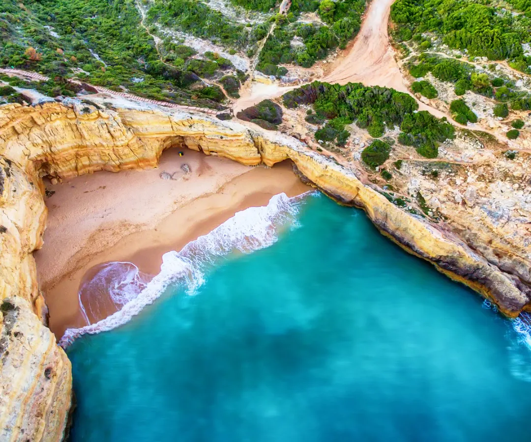 Clear blue water on a beach in Portugal